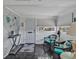 Bright sunroom with seating, decor, and natural light at 2331 Belleair Rd # 214, Clearwater, FL 33764