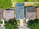 Aerial view showing a home with a screened-in pool and neat backyard, nestled within a residential area at 2510 Cross More St, Valrico, FL 33594