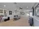 Expansive bonus room with built-in shelving and media center, perfect for entertaining at 2510 Cross More St, Valrico, FL 33594