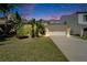 Charming single-Gathering home with lush tropical landscaping and a two-car garage at 2510 Cross More St, Valrico, FL 33594