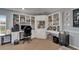 Home office featuring custom built-in cabinets, desk space, and ample storage at 2510 Cross More St, Valrico, FL 33594