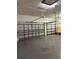 Spacious three-car garage with ample room for vehicles and storage at 2706 Bent Leaf Dr, Valrico, FL 33594