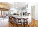 Bright kitchen featuring granite countertops, stainless steel appliances, and a breakfast bar with seating at 2706 Bent Leaf Dr, Valrico, FL 33594