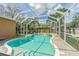 Screened pool and patio area offering a relaxing outdoor retreat with plenty of space at 2706 Bent Leaf Dr, Valrico, FL 33594