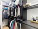 Well-organized walk-in closet with shelves, drawers, and hanging racks for clothing and accessories at 2874 Bayshore Trails Dr, Tampa, FL 33611