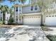 Charming two-story home featuring a two-car garage and well-maintained landscaping at 2874 Bayshore Trails Dr, Tampa, FL 33611