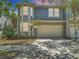 Charming two-story home featuring a two-car garage and well-maintained landscaping at 2874 Bayshore Trails Dr, Tampa, FL 33611