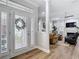 Elegant entry with french doors and a view into a cozy living room with a fireplace at 2874 Bayshore Trails Dr, Tampa, FL 33611
