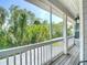 Relaxing screened porch with beautiful green scenery at 2874 Bayshore Trails Dr, Tampa, FL 33611