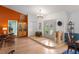 Inviting foyer featuring hardwood floors, decorative lighting, and open layout at 3109 Tarpon Woods Blvd, Palm Harbor, FL 34685