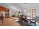 Bright, open-concept living room featuring stylish décor and seamless flow to dining area at 3109 Tarpon Woods Blvd, Palm Harbor, FL 34685
