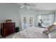 Comfortable main bedroom with lots of natural light, a ceiling fan, and a modern aesthetic at 3109 Tarpon Woods Blvd, Palm Harbor, FL 34685