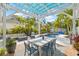 Tropical backyard with covered patio and a beautiful in-ground swimming pool at 330 47Th N Ave, St Petersburg, FL 33703