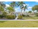 Charming home with lush landscaping, a well-manicured lawn, and inviting front entrance at 330 47Th N Ave, St Petersburg, FL 33703