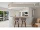 Bright kitchen features a breakfast bar with seating and stainless steel appliances at 330 47Th N Ave, St Petersburg, FL 33703