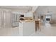 Open-concept kitchen featuring a breakfast bar that connects to the living area at 330 47Th N Ave, St Petersburg, FL 33703