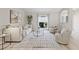 Bright living room with neutral tones, stylish furnishings, and a large window with natural light at 330 47Th N Ave, St Petersburg, FL 33703
