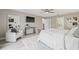 Bright main bedroom with accent chair, plush rug, and wall-mounted television at 330 47Th N Ave, St Petersburg, FL 33703