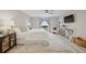 Spacious main bedroom with accent chair, plush rug, and lots of natural light at 330 47Th N Ave, St Petersburg, FL 33703