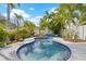 Beautiful pool surrounded by lush tropical landscaping, offering a private oasis for relaxation at 330 47Th N Ave, St Petersburg, FL 33703
