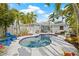 Inviting backyard featuring a sparkling pool, patio, and pergola perfect for outdoor entertaining at 330 47Th N Ave, St Petersburg, FL 33703