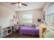 Bedroom with window and ceiling fan offering comfort and function at 4125 89Th E St, Palmetto, FL 34221