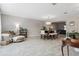Open-concept living and dining area with stylish decor and plenty of natural light at 4417 W Fair Oaks Ave, Tampa, FL 33611
