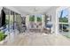 Inviting living room with large windows, comfortable seating, and scenic views at 4750 Dolphin Cay S Ln # 209, St Petersburg, FL 33711