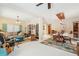 Open-concept living and dining area with ample natural light and stylish furnishings at 515 Orange St, Palm Harbor, FL 34683