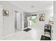Bright bathroom featuring a glass shower, a window, and decor at 5809 Alabaster Stone Ln, Apollo Beach, FL 33572
