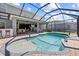 Sparkling screened-in pool and outdoor area, perfect for relaxing and entertaining at 5809 Alabaster Stone Ln, Apollo Beach, FL 33572