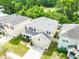 Aerial view of a well-maintained home showcasing the roof and landscaping in a residential neighborhood at 626 Diamond Ridge Rd, Seffner, FL 33584