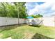 Spacious backyard features a hammock, umbrella and lush green grass at 626 Diamond Ridge Rd, Seffner, FL 33584