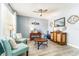 Cozy living room features stylish decor, modern flooring, and ample natural light at 626 Diamond Ridge Rd, Seffner, FL 33584