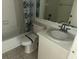 Well-lit bathroom featuring a vanity, toilet and shower/tub combination at 6304 Pointe West Blvd # A206, Bradenton, FL 34209