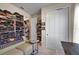 Cozy room with closet, shelving, and desk, perfect as office or hobby room at 6426 Bradford Woods Dr, Zephyrhills, FL 33542