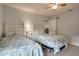 This bedroom has two beds and nautical themed bedding with a ceiling fan, nightstand, and lamp at 6513 14Th W Ave, Bradenton, FL 34209