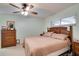 Neutral bedroom with natural lighting and classic ceiling fan at 6513 14Th W Ave, Bradenton, FL 34209
