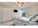 This bedroom has two beds and nautical themed bedding with a TV and a window at 6513 14Th W Ave, Bradenton, FL 34209