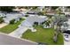 Aerial showcases manicured lawn, new driveway, and updated landscaping enhancing the home's curb appeal at 6513 14Th W Ave, Bradenton, FL 34209