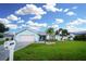 Charming one-story home with a well-manicured front yard and a paved driveway at 6513 14Th W Ave, Bradenton, FL 34209
