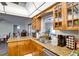 Kitchen featuring granite countertops and decorative wood cabinets at 6513 14Th W Ave, Bradenton, FL 34209