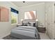 Comfortable bedroom with soft lighting, modern decor, and a serene ambiance for restful nights at 7051 Derwent Glen Cir, Land O Lakes, FL 34637