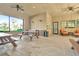 Recreation cabana area featuring picnic tables, a kitchenette, and seating for residents' enjoyment at 7051 Derwent Glen Cir, Land O Lakes, FL 34637