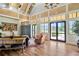 Clubhouse interior with decorative wood accents, tile floor, comfortable seating, and ample natural light at 7051 Derwent Glen Cir, Land O Lakes, FL 34637