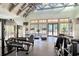 Spacious gym with state-of-the-art treadmills and weight machines, providing a comprehensive workout area at 7051 Derwent Glen Cir, Land O Lakes, FL 34637