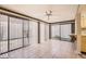 Bright Florida room with tile floors, large windows, and outdoor access at 7509 Rocky Point Dr, Hudson, FL 34667