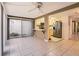 Efficient kitchen next to bright Florida room with access to outdoor space at 7509 Rocky Point Dr, Hudson, FL 34667