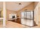 Spacious living room with tile/hardwood floors, fireplace, and sliding glass doors at 7509 Rocky Point Dr, Hudson, FL 34667