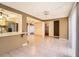 Open living space with bar seating, dining area, and airy floor plan at 7509 Rocky Point Dr, Hudson, FL 34667